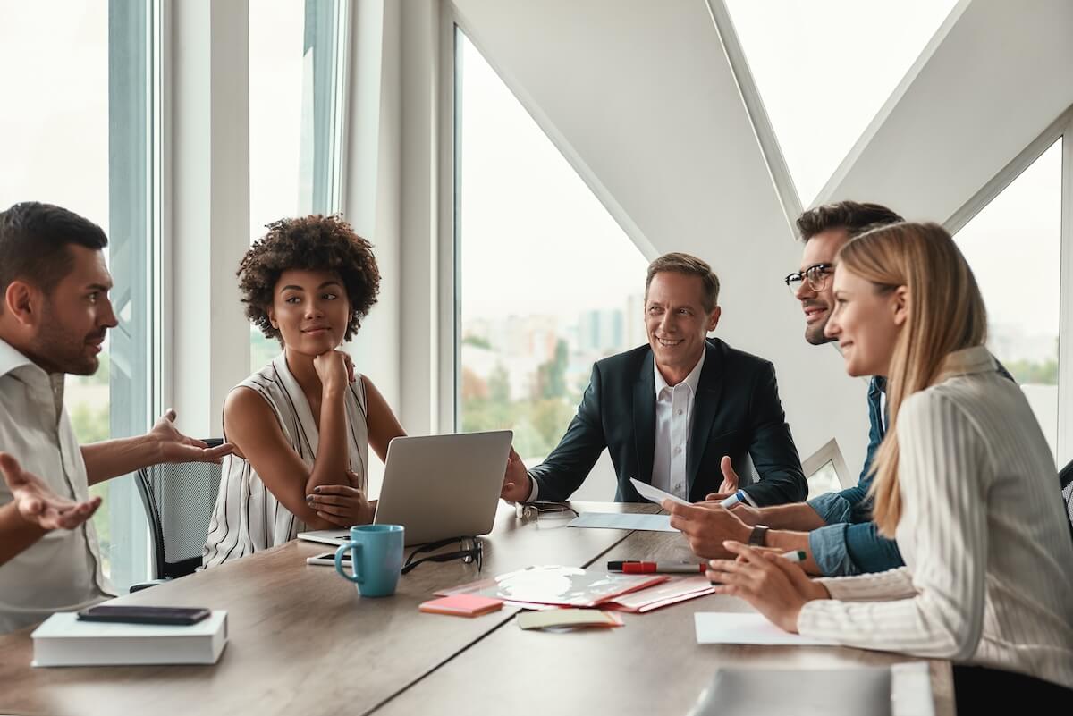 Technology consulting: team having a light discussion in conference room